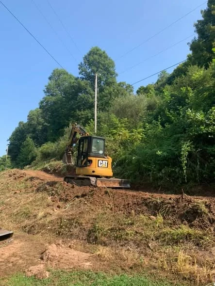 Excavator building road